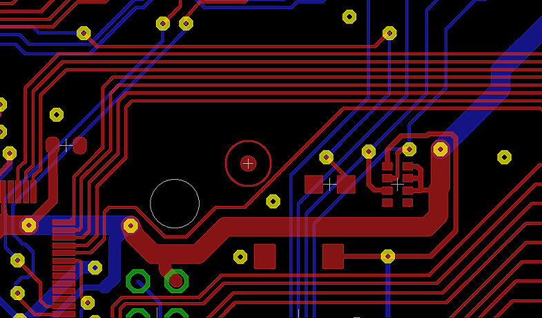 Multilayer PCB layout being routed in CAD, showing differential pairs and via fan-out.